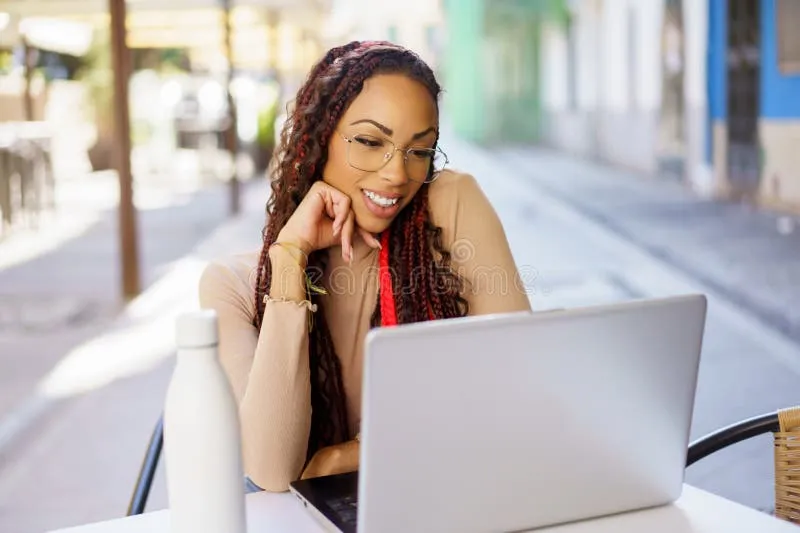A woman working on her laptop during a movie went viral